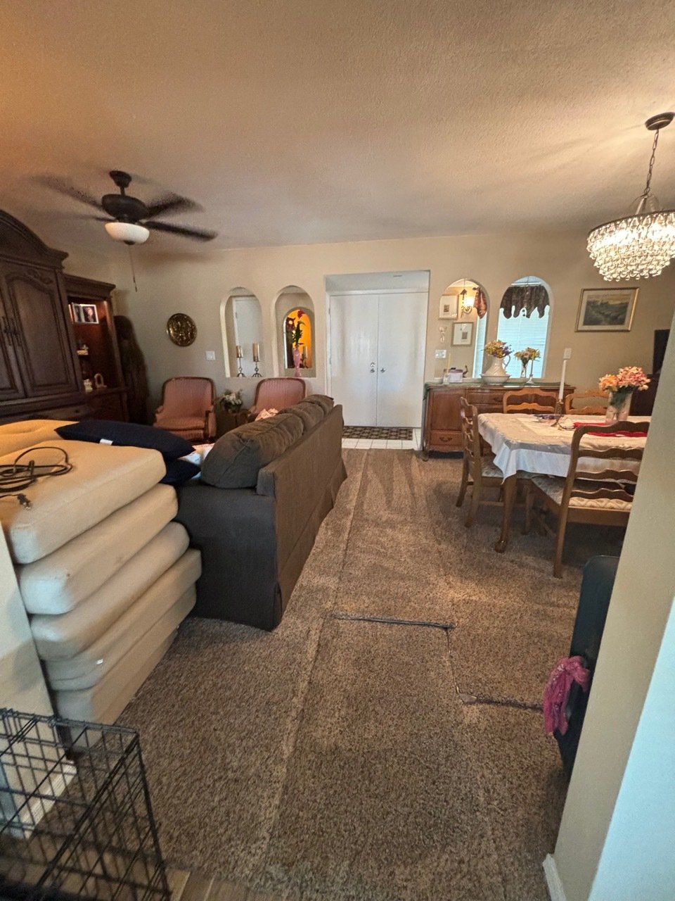 Cleaning professional from EverFresh scrubbing bathroom tiles
